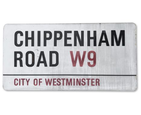An enamelled iron street sign for Chippenham Road W9, City of Westminster with iconic black and red sans serif lettering firs