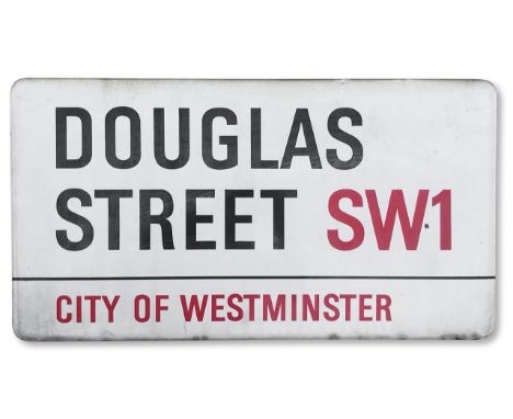 An enamelled iron street sign for Douglas Street SW1, City of Westminster, with iconic and black and red sans serif lettering
