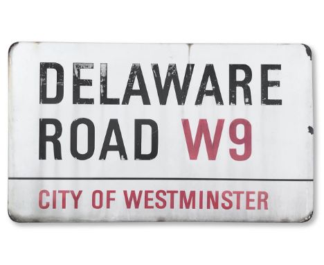 An enamelled iron street sign for Delaware Road W9, City of Westminster, with iconic and black and red sans serif lettering f