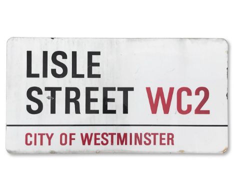 An enamelled iron street sign for Lisle Street WC2, City of Westminster, with iconic and black and red sans serif lettering f