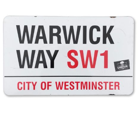 An enamelled iron street sign for Warwick Way, City of Westminster, with iconic and black and red sans serif lettering first 