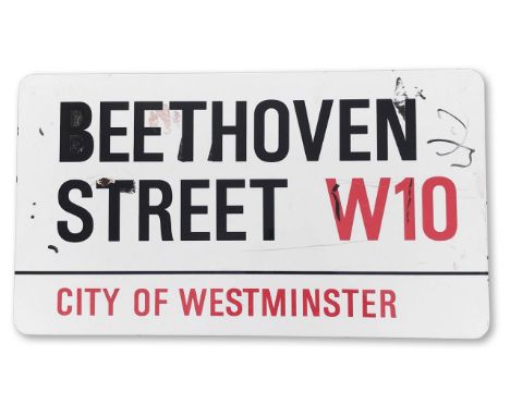 An enamelled iron street sign for Beethoven Street W10, City of Westminster, with iconic black and red sans serif lettering f