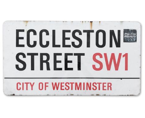 An enamelled iron street sign for Eccleston Street SW1, City of Westminster with iconic black and red sans serif lettering fi