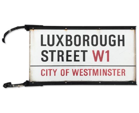 An enamelled iron street post sign for Luxborough Street W1, City of Westminster, double sided with iconic and black and red 