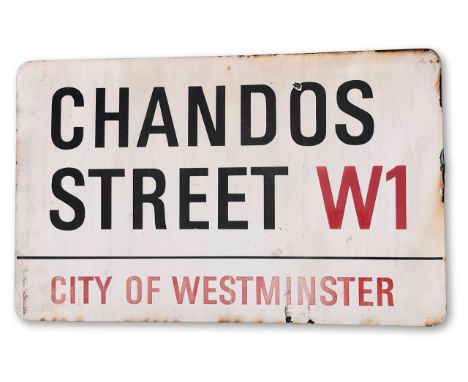 An enamelled iron street sign for Chados Street W1, City of Westminster, with iconic black and red sans serif lettering first