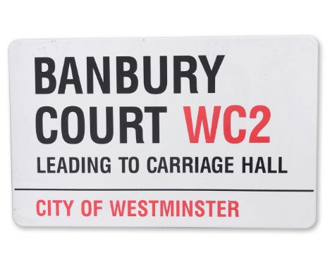 An enamelled iron street sign for Banbury Court WC2 Leading to Carriage Hall, City of Westminster, with iconic and black and 