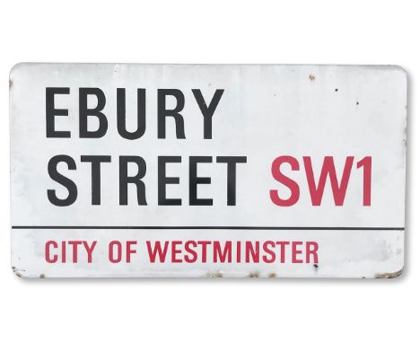 An enamelled iron street sign for Ebury Street SW1, City of Westminster, with iconic and black and red sans serif lettering f