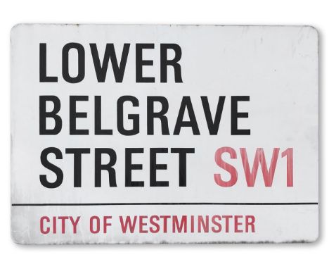 An enamelled iron street sign for Lower Belgrave Street SW1, City of Westminster, with iconic and black and red sans serif le