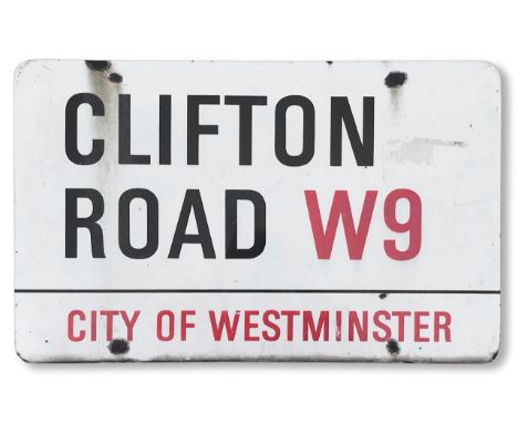 An enamelled iron street sign for Clifton Road W9, City of Westminster, with iconic and black and red sans serif lettering fi