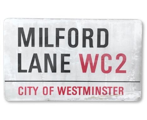 An enamelled iron street sign for Milford Lane WC2, City of Westminster, with iconic and black and red sans serif lettering f