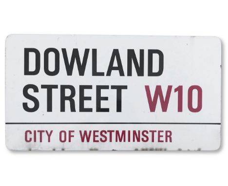 An enamelled iron street sign for Dowland Street W10, City of Westminster, with iconic and black and red sans serif lettering