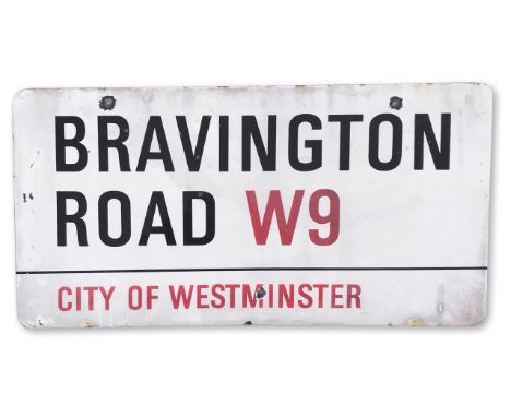 An enamelled iron street sign for Bravington Road W9, City of Westminster, on part wooden frame to back, with iconic and blac
