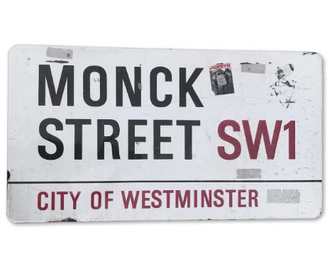An enamelled iron street sign for Monck Street SW1, City of Westminster, post bracket with iconic black and red sans serif le