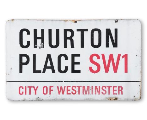 An enamelled iron street sign for Churton Place SW1, City of Westminster, with iconic and black and red sans serif lettering 