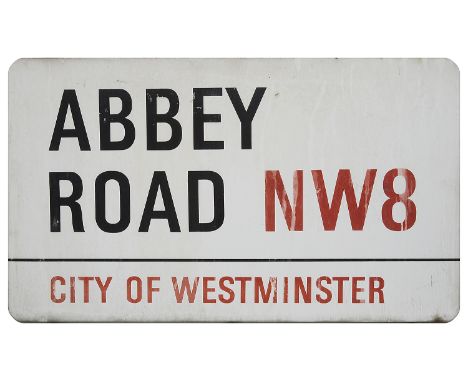 An enamelled iron street sign for Abbey Road NW8, City of Westminster, with iconic black and red sans serif lettering first c
