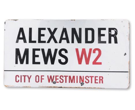 An enamelled iron street sign for Alexander Mews W2, City of Westminster, with iconic black and red sans serif lettering firs