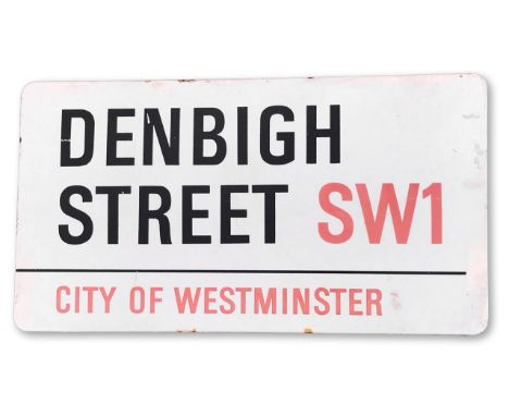 An enamelled iron street sign for Denbigh Street SW1, City of Westminster, part wooden board to back, with iconic black and r