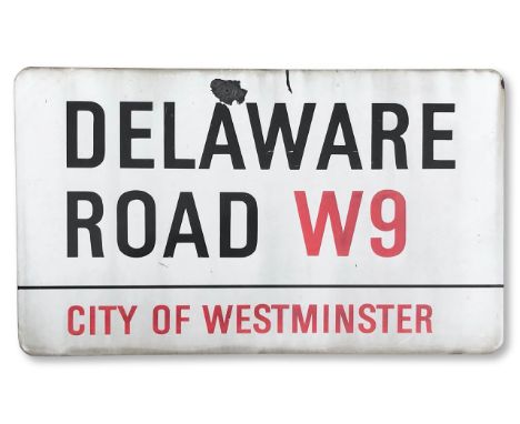 An enamelled iron street sign for Delaware Road W9, City of Westminster, with iconic and black and red sans serif lettering f