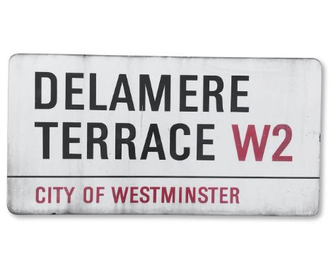 An enamelled iron street sign for Delamere Terrace W2, City of Westminster, with iconic and black and red sans serif letterin