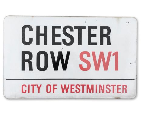 An enamelled iron street sign for Chester Row SW1, City of Westminster, with iconic black and red sans serif lettering first 