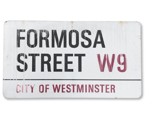 An enamelled iron street sign for Formosa Street W9, City of Westminster, with iconic and black and red sans serif lettering 