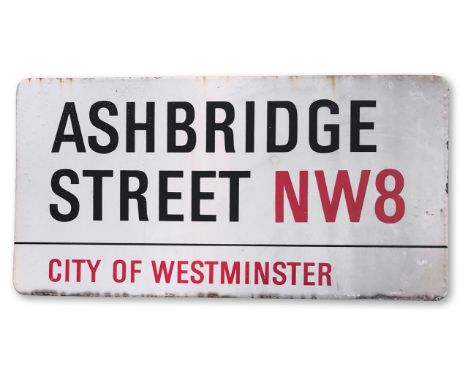 An enamelled iron street sign for Ashbridge Street NW8, City of Westminster, with iconic and black and red sans serif letteri