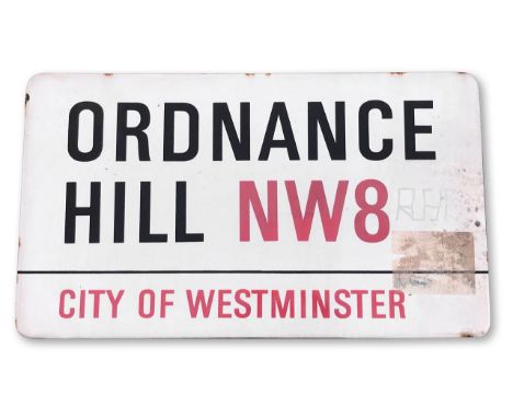 An enamelled iron street sign for Ordnance Hill NW8, City of Westminster, on wooden frame to back, with iconic black and red 