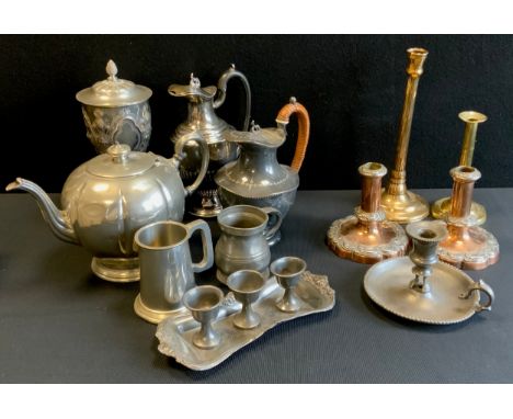 A Victorian Britannia metal chalice and cover, embossed floral motifs;  teapots, brass ejector candlestick, pewter chambersti
