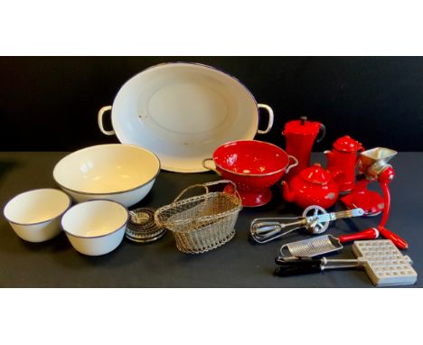 Kitchenalia - Large white enamel bowl, others conforming; red enamel kitchenalia including coffee and tea pot, cullender; etc