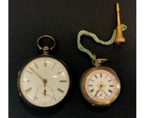 A Victorian silver open face pocket watch, white enamel dial, bold Roman numerals, key wind movement, Chester 1875;  another 