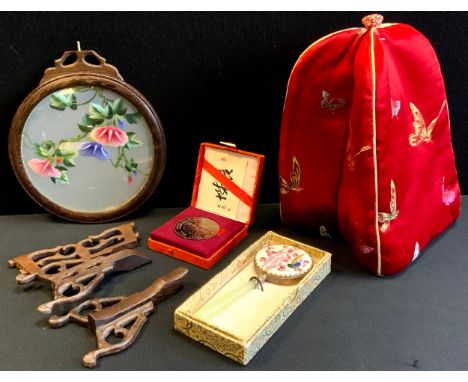 A Chinese swivel table screen, embroidered floral panel, carved stand, boxed;  green stone handled hand mirror, possibly jade