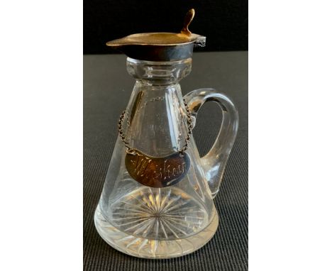 A George V silver mounted glass whisky jug, silver spout and cover, Birmingham 1911, with a small Hukin &amp; Heath Ltd Whisk