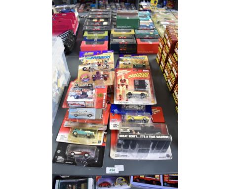Fifteen Playing Mantis Johny Lightning die-casts including Wacky Winners, Back to the Future, Daredevil, Chevy etc, all on bu