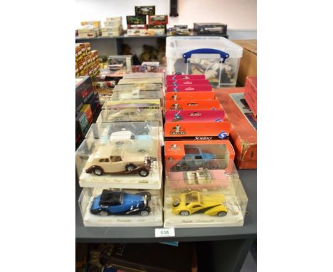 Twenty Six Solido die-casts including Bugatti, Mercedes, Cadillac etc, all in plastic or card display boxes