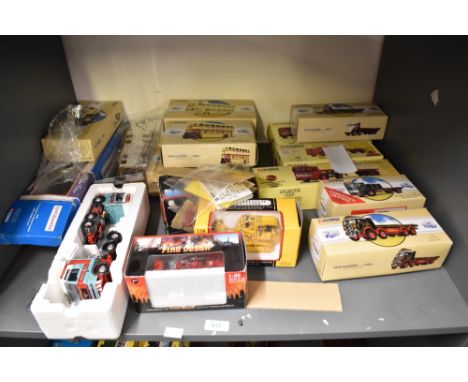 A shelf of modern diecasts, Corgi Classics x 10, Wagons and Buses,  First Gear Fire Dozer x2, First Gear International Harves