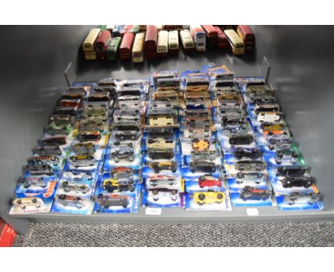 A shelf of 1990's, 2000's Mattel Hot Wheels die-casts, 86 in total all on bubble cards