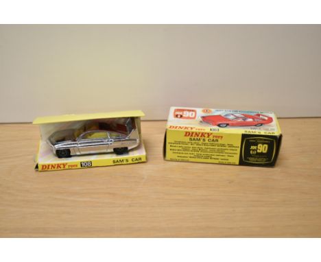 A Dinky die-cast, 108 Sam's Car, silver with yellow interior, on inner card stand with lapel badge, instruction leaflet prese