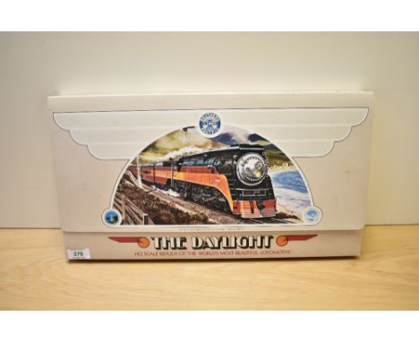 A Bachmann HO scale Southern Pacific 4-8-4 Locomotive with 48' Tender, 4449 The Daylight, in original packaging