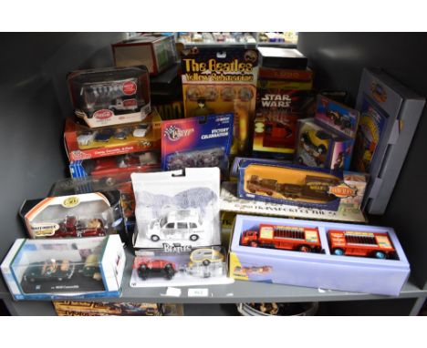 A shelf of modern die-casts including Corgi Chipperfield 97889 AEC Cage Truck and Trailer, 97887 Bedford O Articulated Horseb