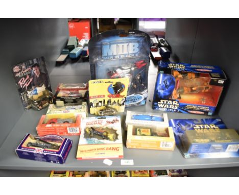 A shelf of modern die-casts including Hasbro Star Wars Episode 1 Sebulba's Podracer, , Men in Black II, ERTL Dick Tracy etc, 