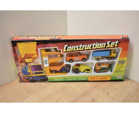 A 1975 Matchbox G13 Construction Set, Granule Hopper, Site Engineers Car, Big Bulldozer, Rod Roller, Atlas Tipper Truck and A