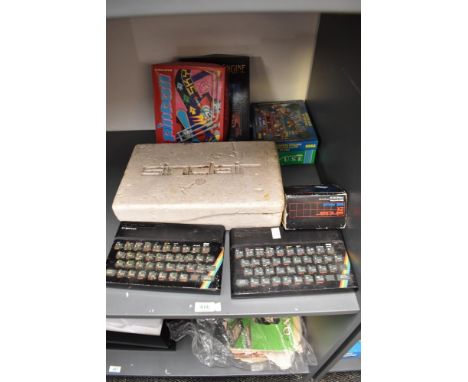 A Sinclair ZX81 Personal Computer in polystyrene box, Two Sinclair ZX Spectrum Personal Computers, Sinclair ZX 16 K Ram in or