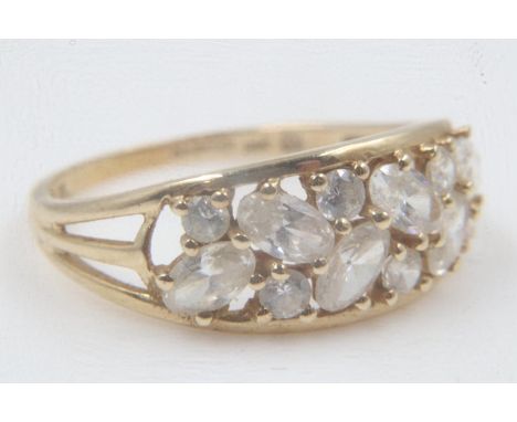 14ct gold pierced ring set with CZ, size U, 3.1g. UK P&amp;P Group 0 (£6+VAT for the first lot and £1+VAT for subsequent lots
