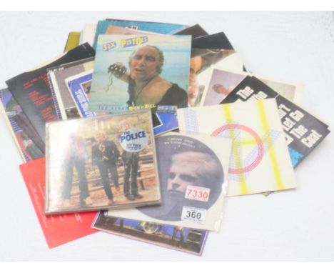 Fifteen singles including Tubeway Army, Gary Numan and a quantity of picture discs sleeves including Kraftwerk. UK P&amp;P Gr