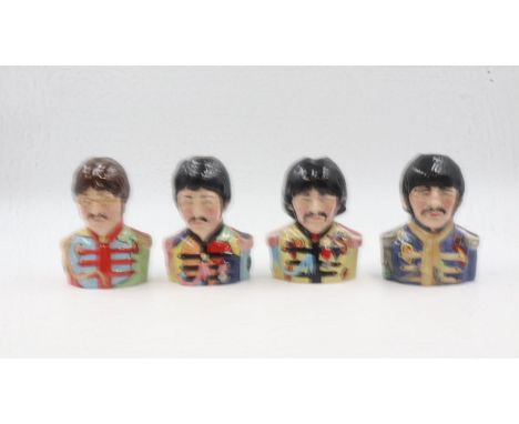 Set of four Beatles character jugs, Sgt. Peppers limited edition, no. 544, H: 14 cm. UK P&amp;P Group 3 (£30+VAT for the firs