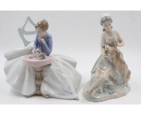 Large Nao figurine, Playing With Kitty, H: 22 cm, and a further example. UK P&amp;P Group 3 (£30+VAT for the first lot and £8