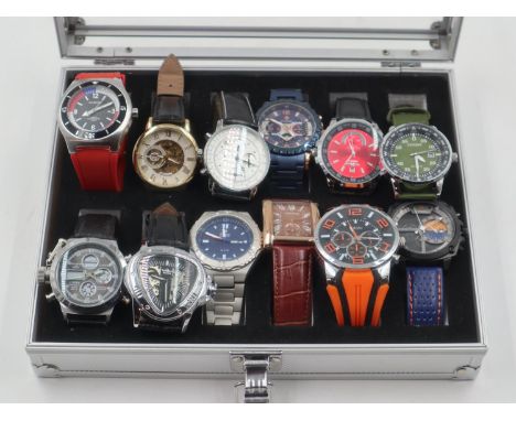 Presentation case of twelve gents black dial wristwatches. UK P&amp;P Group 2 (£20+VAT for the first lot and £4+VAT for subse