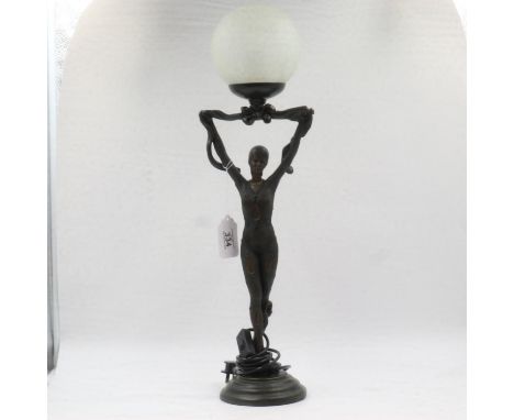 Art Deco style figural lamp with glass ball shade, overall H: 66 cm. All electrical items in this lot have been PAT tested fo