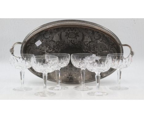 Six Waterford Crystal champagne coups/glasses in the Kildare pattern, together with an oval silver plated gallery tray. UK P&