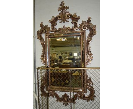 Italian style silvered composition pier glass, rectangular bevelled plate, in a mirrored surround, scrolled outlines, 135cm x